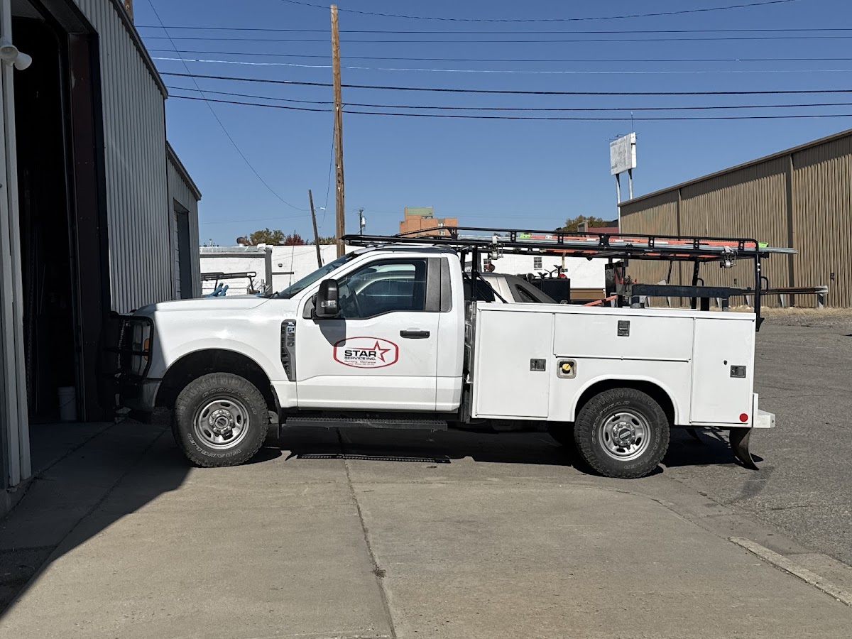 Star Service plumbing work truck outside the Billings shop