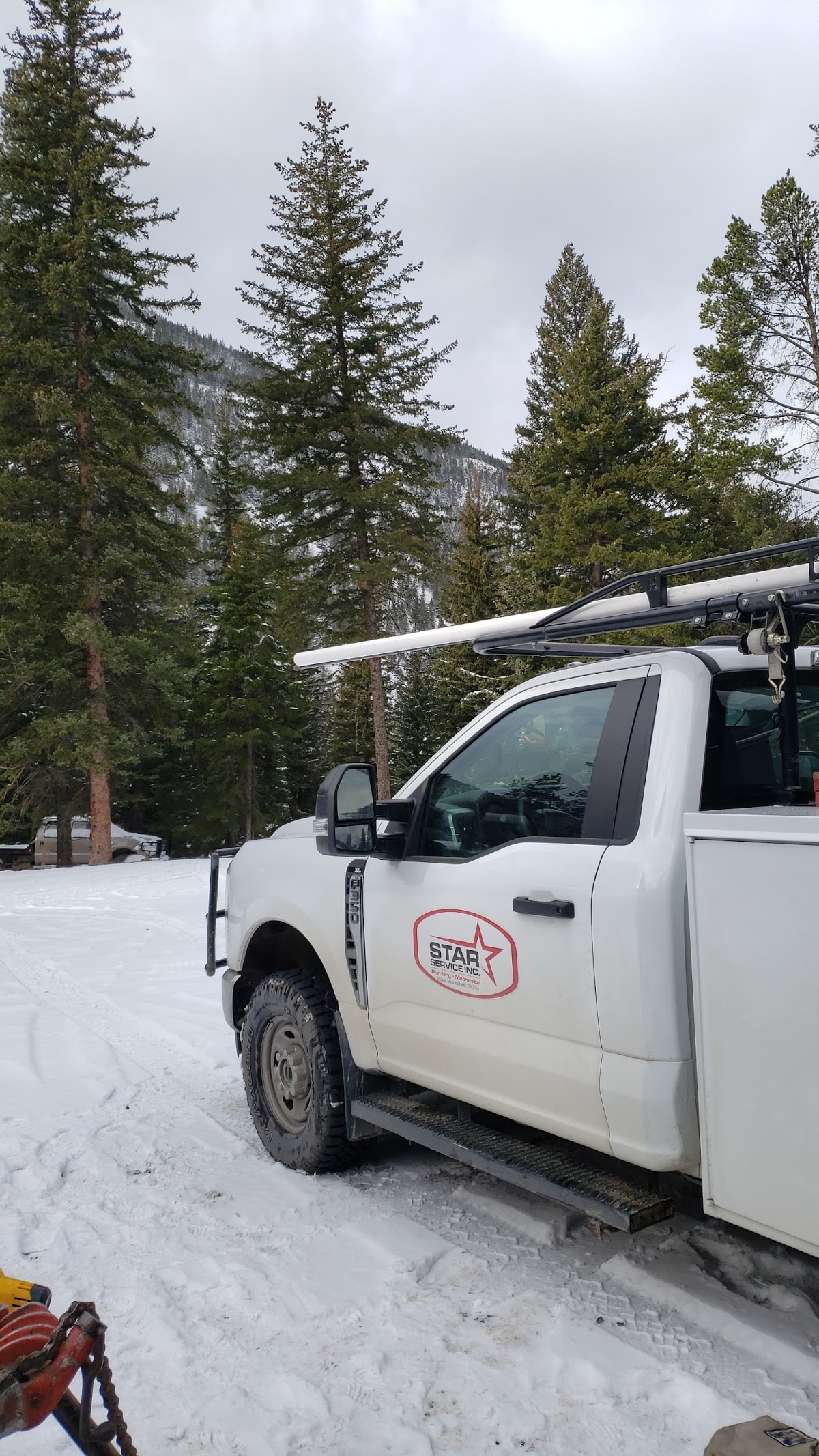Star Service truck on a snowy Montana job in the mountains